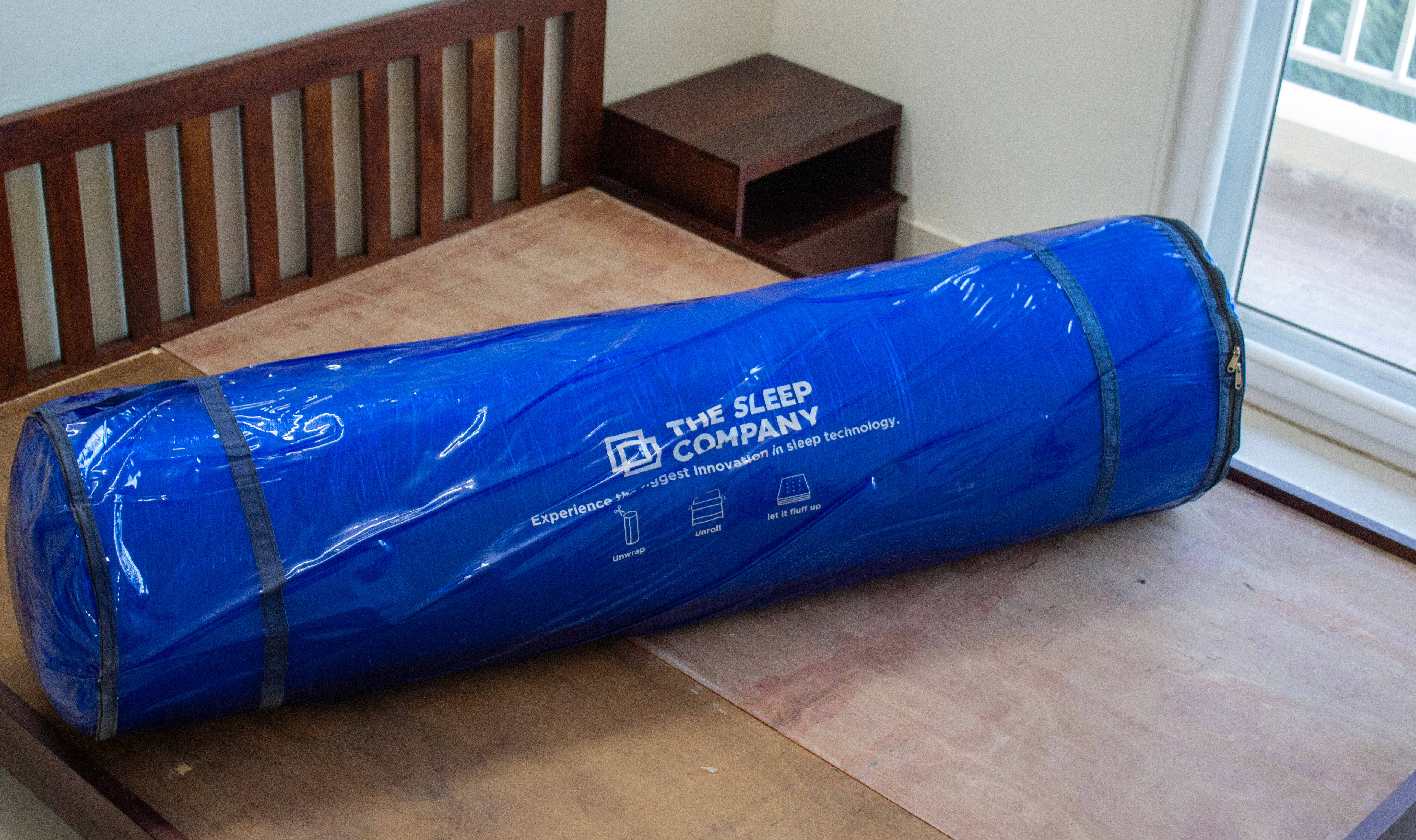 Unpacking The Sleep Company mattress.